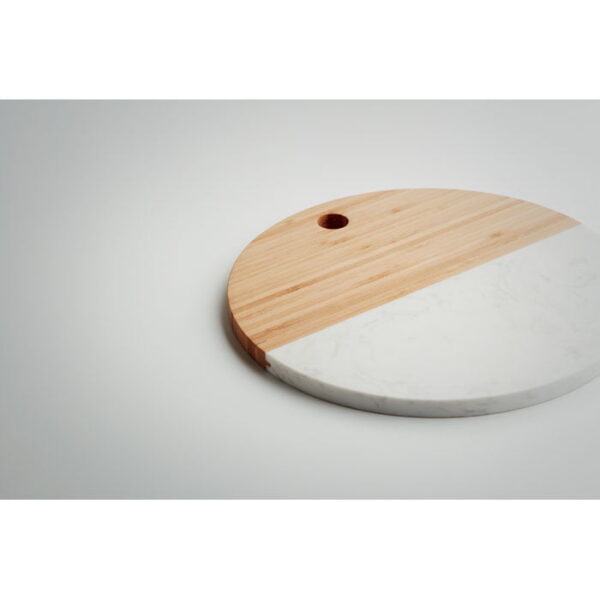 Elegant marble and bamboo serving board for stylish presentations